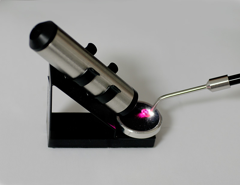 The desk model OPL spectroscope on an angled stand. When combined with a fiber-optic light source, this instrument is both inexpensive and powerful. Photo: R.W. Hughes