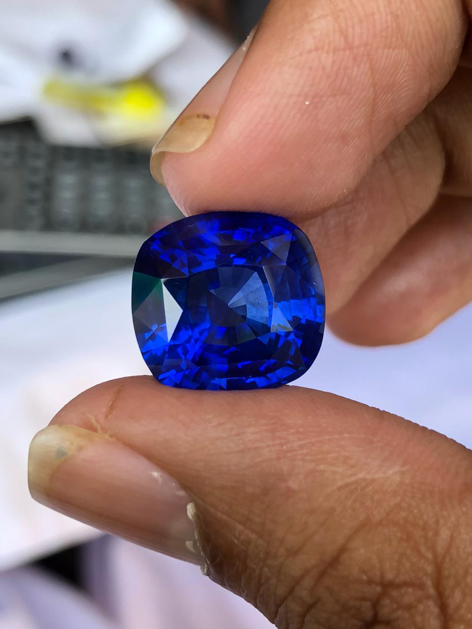 Right: The same sapphire after final polishing. Obviously, a paper clip could scratch the graphite crust, but it would have no impact on the sapphire after polishing.