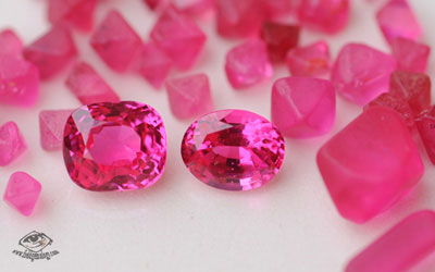 Hot pink spinels in rough and cut form from Namya, Burma. Photo: V. Pardieu, 2005.