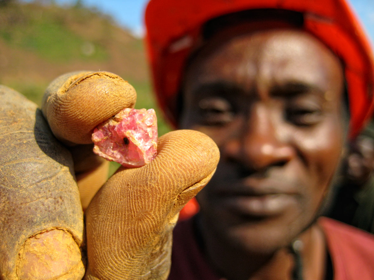 A miner at Ipanko holds a fragment of spinel. Photo: Michael Rogers