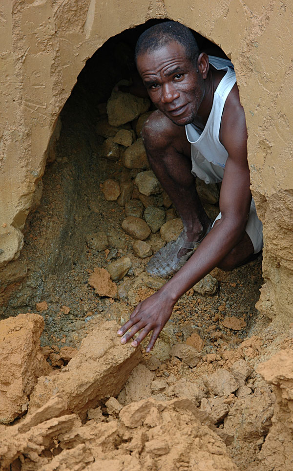 Our Malagasy guide, Gaeton, emerging from a pit at Andrebabe. Photo: Richard W. Hughes