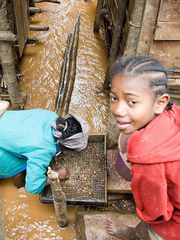 Mining the muddy streets of Moramanga. Photo: Richard W. Hughes