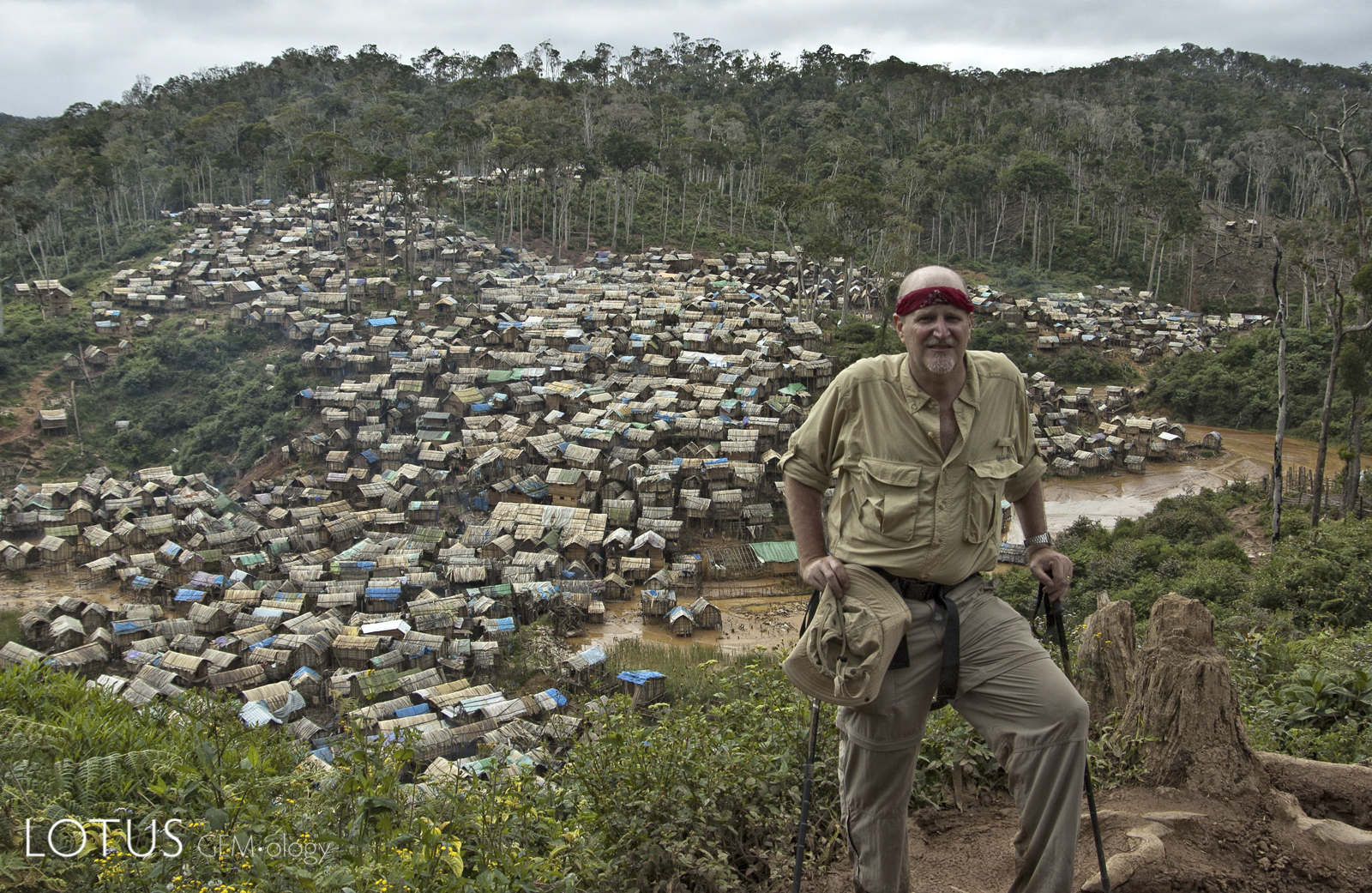 The author above Moramanga, Madagascar in 2005. The area at the time was producing large quantities of ruby used for glass filling, as well as polychrome sapphire. Photo: Dana Schorr.