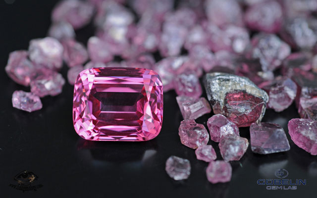 Fine Pamir spinel (over 20 carats) from Tajikistan, with rough spinels from the Kuh-i-Lal mines. Photo: Vincent Pardieu/Gübelin Gem Lab, 2008.