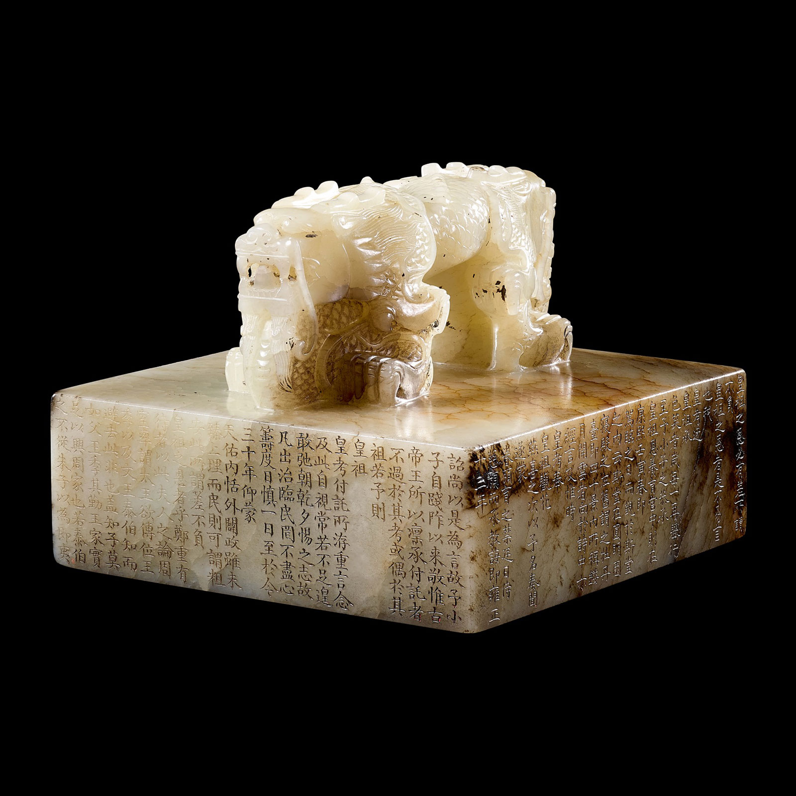 Figure 10. This large white imperial nephrite "Xintian Zhuren" seal sold in 2010 for US$15,680,467, at the time a price even beyond that of any jadeite jade.  Image © Sotheby's