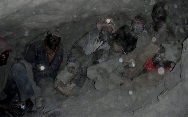 Guillaume Soubiraa and Philippe Brunot in the tight confines of a tanzanite mine at Merelani's Block D, along with local miners. Photo: Vincent Pardieu