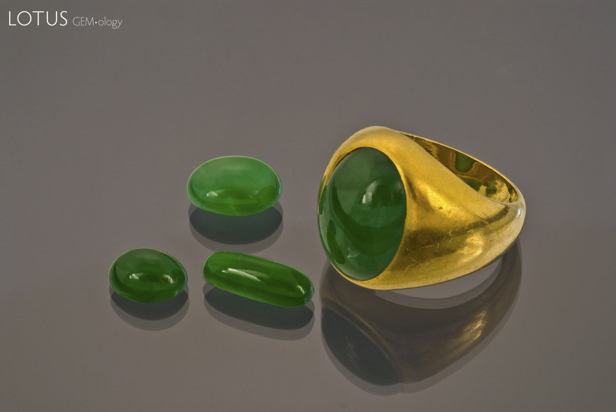 Figure 5. Fei-ts'ui Imperial jadeite ring and cabochons. Courtesy Pala International; photo: Wimon Manorotkul