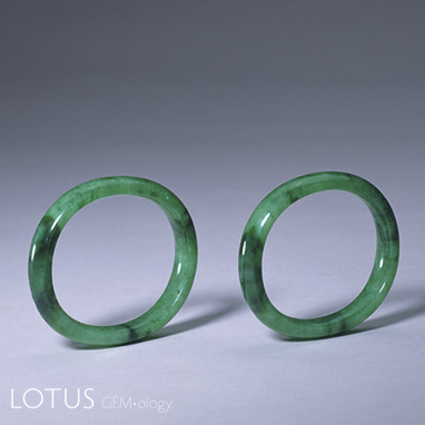 Figure 4. Pair of Qing court fei cui bracelets in Beijing's Palace Museum; outer diameter 7.6 cm, inner diameter 5.6 cm. Photo: Palace Museum, Beijing.