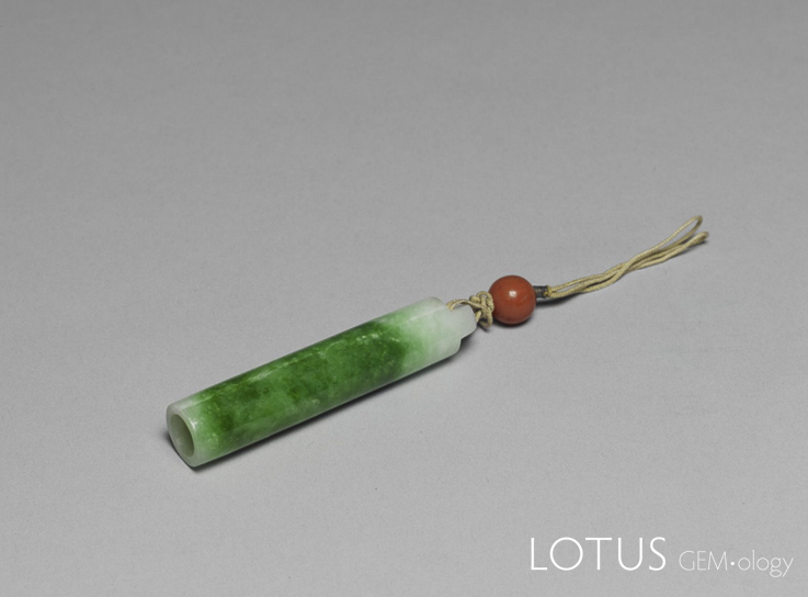 Figure 7. Fei cui feather-tube fastener in the National Palace Museum, Taipei, later modified into a pendant. Photo: National Palace Museum, Taipei.