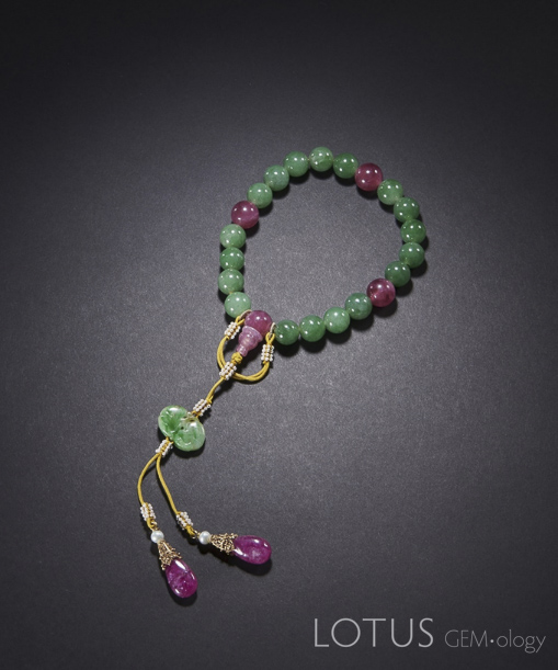 Figure 9. Qing Dynasty fei cui &ldquo;eighteen beads&rdquo; bracelet; circumference 30 cm, bead diameter 1.2 cm. Photo: Palace Museum, Beijing, Inventory No.&nbsp;故00009720.