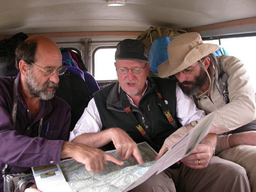 Dana Schorr, Richard Hughes and Vincent Pardieu examine the route to Badakhshan's ruby and spinel mines. Photo: Surat Toimastov