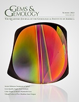 G&G Microworld: Guest in garnet: Metal sulfide?