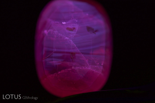 Shortwave ultraviolet can often reveal heat treatment even at relatively low temperatures. Low-iron rubies, padparadschas and blue sapphires will often display a zoned chalky fluorescence following heat treatment. It is generally the colorless areas of the stone that show this. The presence of chalky SW fluorescence is a strong indication of heat treatment.