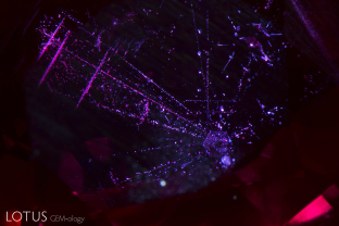 Undissolved rutile silk in the basal plane of this ruby from Montepuez, Mozambique, creates a lovely pattern.