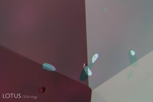 When cut through on the surface, these primary rutile inclusions display a submetallic luster. Untreated Ambodivoahangy ruby from Madagascar.