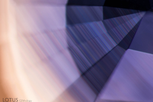These fine parallel lines show the sharp angular growth zoning typical in Madagascar sapphire. These lines can be distinguished from polishing lines because they cross several facets.