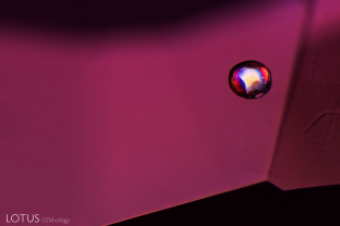 This rounded apatite crystal displays interference colors between crossed polars in a Tanzanian spinel.