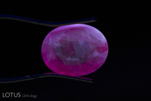 When Burmese rubies, such as this stone from Mong Hsu, are heat treated, they often develop a zoned chalky fluorescence in shortwave UV.