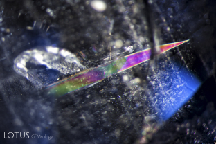 An iridescent dagger lances the heart of this sapphire from Myanmar’s Mogok Stone Tract.