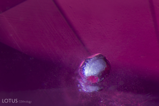 This frosty-looking melted crystal provides evidence that it’s Tanzanian spinel host was heat treated.