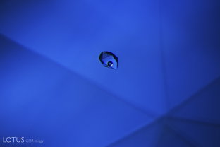 A frozen gas bubble shines in a negative crystal in this heated basaltic sapphire.