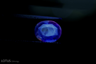 Unusual zone of strong chalky fluorescence in unheated Ceylon sapphire.