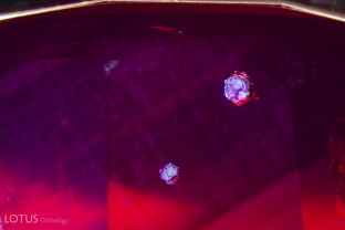 Mica crystals shine in this unheated Mozambique ruby.