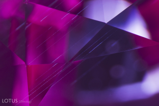 Fine needles shine bright in this Mahenge spinel when illuminated with diffuse fiber optic light.