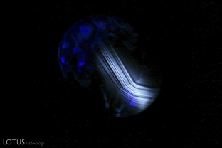 Angular zoned chalky shortwave fluorescence provides evidence that this Madagascar sapphire was heated.