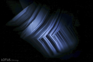 Angular zoned chalky shortwave fluorescence provides evidence that this Madagascar sapphire was heated.