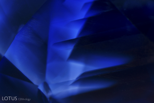 Dense “parquet” style zoned clouds in an untreated Sri Lanka sapphire.