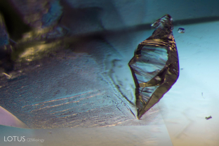 Written in stone. A large negative crystal appears to have inscribed a delicate pattern in this untreated sapphire from Sri Lanka.