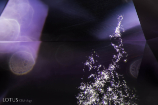 Irregular clouds of particles of unknown identity in spinel from Afghanistan; FOV ~6 mm