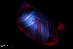 Angular zoned chalky fluorescence like this is a tell-tale sign of heat treatment.