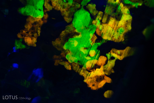 A beautiful play-of-color effect is captured in this opal image.
