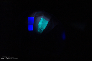 A superficial chalky patch is visible when this sapphire is viewed under shortwave UV illumination. While a chalky shortwave UV fluorescence is generally a strong indicator of heat treatment, on occasion we have seen these superficial patches in stones we believe to be untreated.