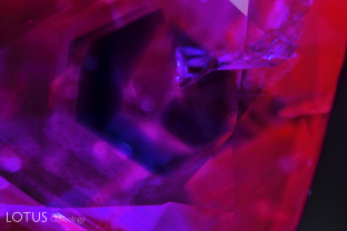 Virtually all Burmese rubies from Mong Hsu feature deep blue cores surrounded by cottony diaspore silk, as shown here. In previous times, most of this material was heated with flux to remove the blue areas and heal the fissures. However with the high price difference between natural and heated rubies, we now see many Mong Hsu rubies that have not been treated.