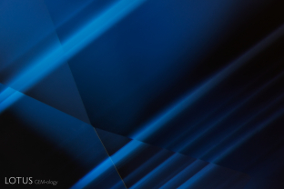 Viewed under the microscope this sapphire displays straight zoned bands of fine texture clouds, giving the stone a soft glow.