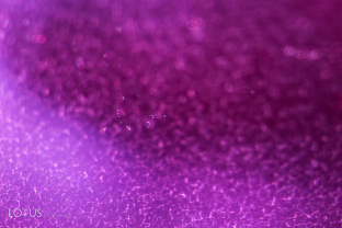 On rare occasions, we encounter synthetic gems that have been subjected to heat or diffusion treatment. Here we see pinpoint inclusions in a diffusion-treated synthetic ruby. 