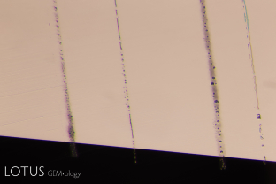 The rose channels in this Madagascar blue sapphire have melted and begun to “neck down” due to the high temperature it was exposed to during beryllium diffusion treatment.