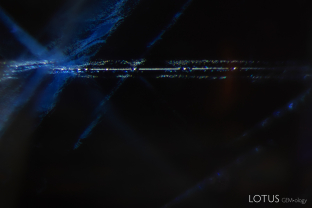 Appearing like stardust against the night sky, streams of tiny particles can be seen in the interior of this blue sapphire.