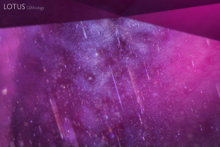 Clouds of silk in elongated needles and shorter, finer needles create a misty appearance in this spinel.