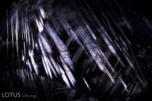 Stellate (star-like) dislocations decorate the interior of this violet spinel from Vietnam’s Luc Yen district. These may sometimes alter to högbomite.