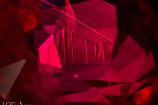 Angular growth zoning is a common feature in rubies from Mong Hsu, Burma. Growth zoning reveals the shape of a crystal at an earlier point in its development.