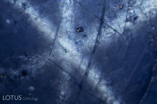 This Burmese sapphire was diffused with titanium to induce both a blue color and a star. The rutile silk in such a diffused star occurs in extremely short needles in a shallow layer at and just below the surface.