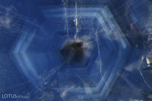 Fine exsolved particles and milky zones outline the shape of the crystal as it grew in this unheated sapphire from Lava Plains.