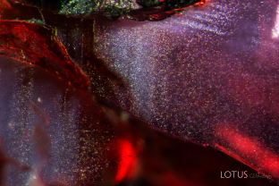 Fine exsolved particles in this ruby from Rolela, Kiteto, Tanzania.