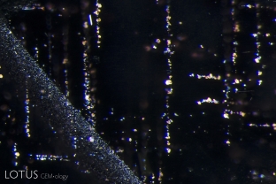 Reflective silk platelets in this star spinel create a scene reminiscent of city lights in the evening.