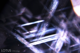 Stellate (star-like) dislocations decorate the interior of this violet spinel from Vietnam’s Luc Yen district. These may sometimes alter to högbomite.